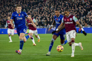 James Tarkowski and Ashley Young chase down West Ham player