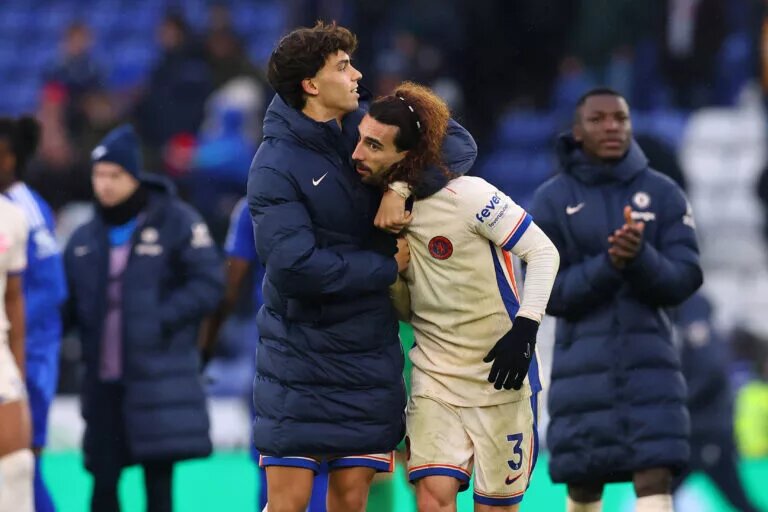 Joao Felix embraces Marc Cucurella following Leicester win