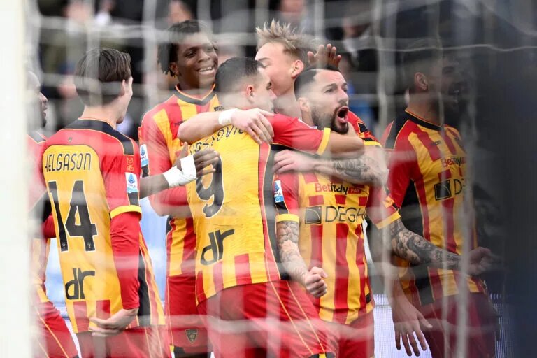 Patrick Dorgu celebrates with Lecce teammates