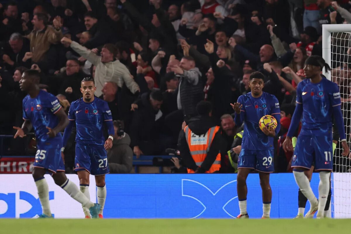 Wesley Fofana holds the match ball after Chelsea conceded against Arsenal