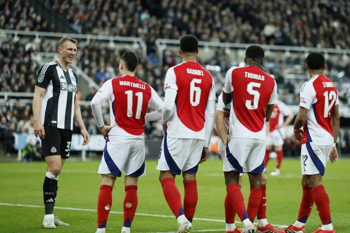 Dan Burn laughs with Arsenal's Gabriel Martinelli, Gabriel, Thomas Partey and Jurrien Timber