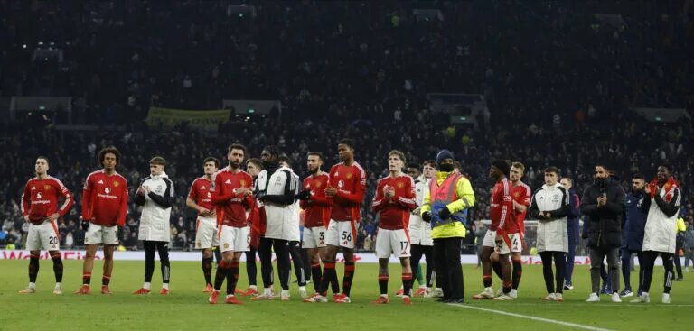 Manchester United fans pictured applauding fans following a match