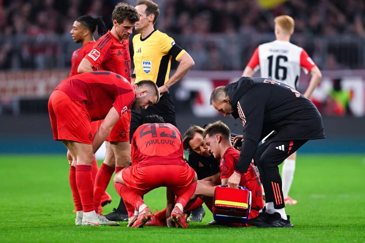 Eric Dier and Thomas Muller console the injured Joshua Kimmich