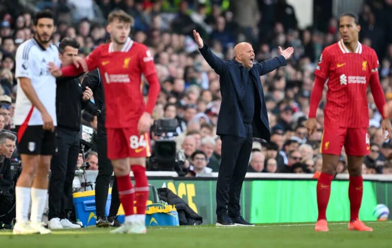 Liverpool vs Brentford lineups- image of Arne Slot on the touch line