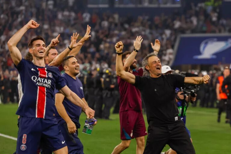 PSG confirmed lineup - image of squad celebrating UCL win