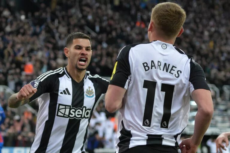 Newcastle vs Leeds confirmed lineups - image of Bruno Guimaraes and Harvey Barnes celebrate goal