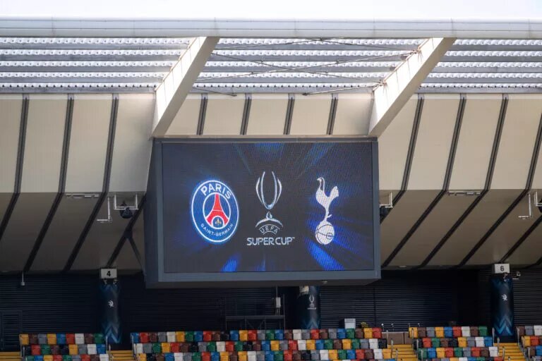 PSG vs Tottenham hotspur confirmed lineups - image of screen showing club logos ahead of fixture