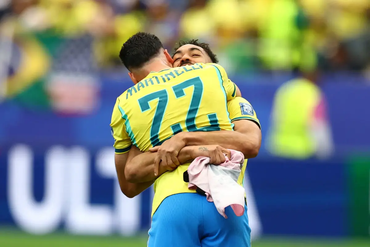 Brazil predicted lineup: Brazil's Matheus Cunha and Gabriel Martinelli celebrate after the match