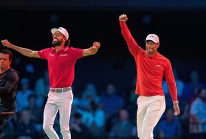 Akshay Bhatia and Tiger Woods celebrating TGL victory
