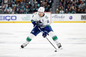 SEATTLE, WASHINGTON - JANUARY 25: Bo Horvat #53 of the Vancouver Canucks skates against the Seattle Kraken during the third period at Climate Pledge Arena on January 25, 2023 in Seattle, Washington. (Photo by Steph Chambers/Getty Images)