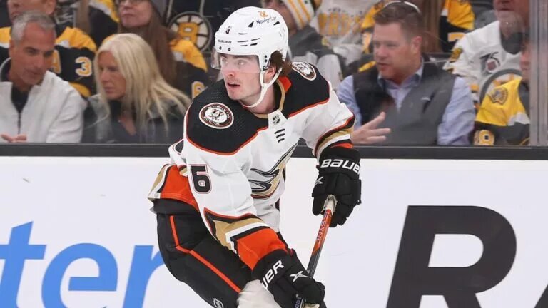 Anaheim Ducks defenceman Jamie Drysdale (6) skates wearing the team's white away jersey.