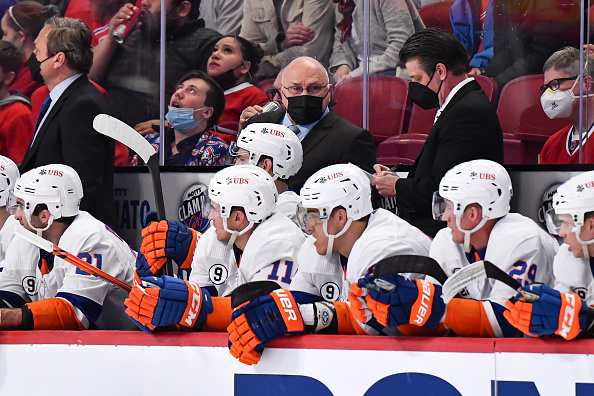 Head coach of the New York Islanders, Barry Trotz, handles bench duties against the Montreal Canadiens during the third period at Centre Bell on April 15, 2022 in Montreal, Canada. The New York Islanders defeated the Montreal Canadiens 3-0.