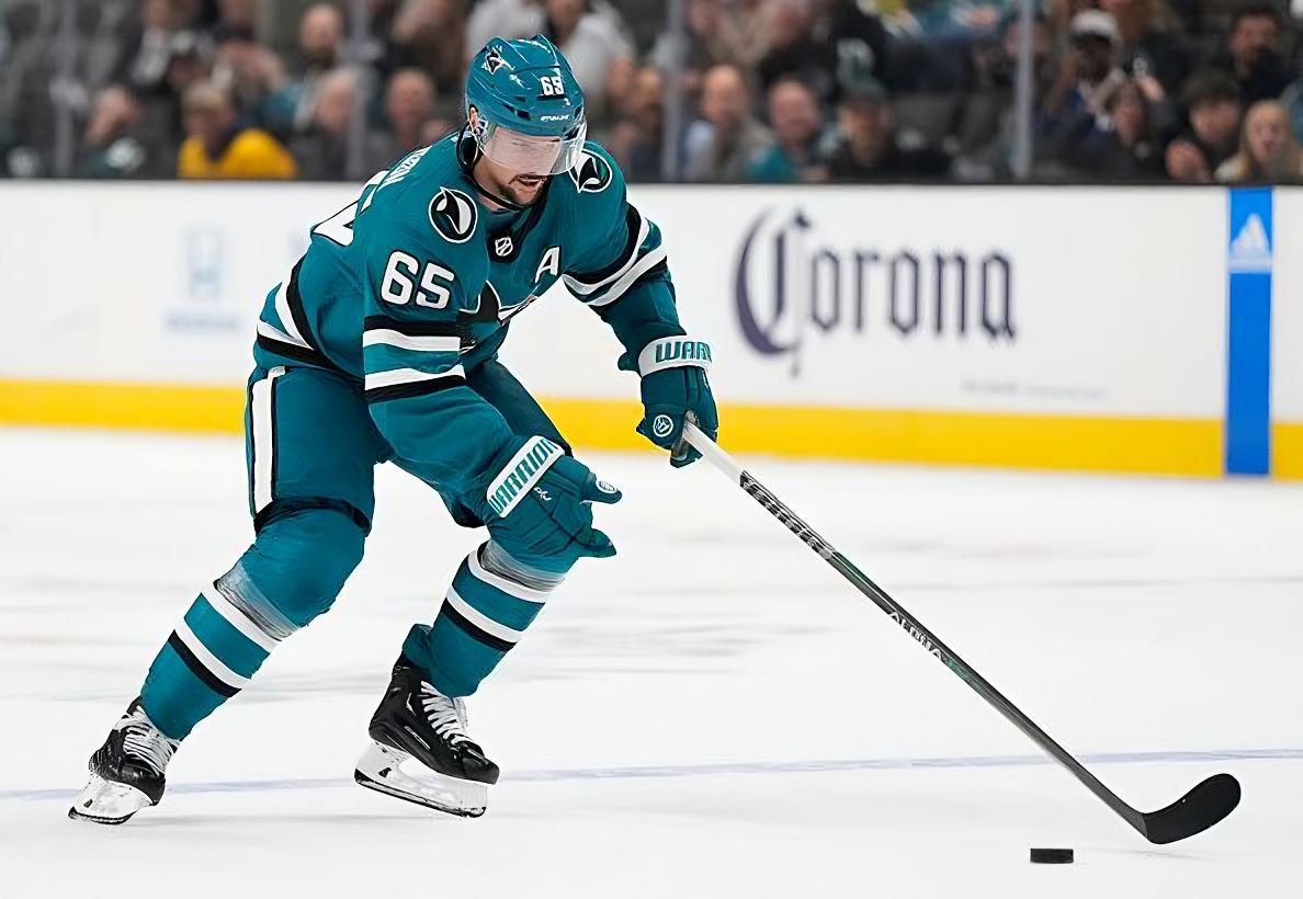 SAN JOSE, CALIFORNIA - OCTOBER 27: Erik Karlsson #65 of the San Jose Sharks skates up ice on a break away against the Toronto Maple Leafs during the overtime period of an NHL hockey game at SAP Center on October 27, 2022 in San Jose, California. (Photo by Thearon W. Henderson/NHL Getty Images)