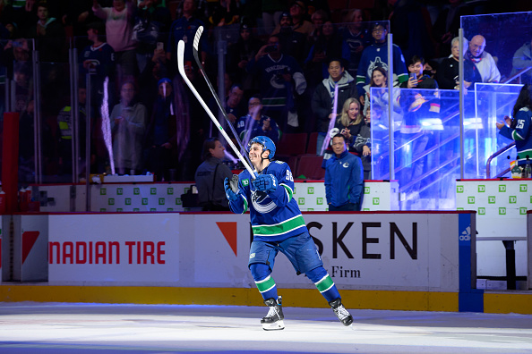 VANCOUVER, CANADA - NOVEMBER 3: Andrei Kuzmenko #96 of the Vancouver Canucks skates after being named 1st star of the game after their NHL game against the Anaheim Ducks at Rogers Arena on November 3, 2022 in Vancouver, British Columbia, Canada. Vancouver won 8-5. (Photo by Derek Cain/Getty Images)