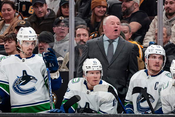 BOSTON, MA - NOVEMBER 10: Vancouver Canucks head coach Bruce Boudreau yells instruction during a game between the Boston Bruins and the Calgary Flames on November 10, 2022, at TD Garden in Boston, Massachusetts. (Photo by Fred Kfoury III/Icon Sportswire via Getty Images)
