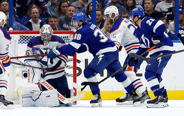 TAMPA, FLORIDA - NOVEMBER 08: Jack Campbell #36 of the Edmonton Oilers stops a shot from Brandon Hagel #38 of the Tampa Bay Lightning during a game at Amalie Arena on November 08, 2022 in Tampa, Florida. (Photo by Mike Ehrmann/Getty Images)