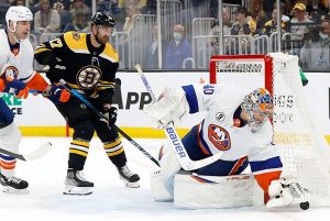 BOSTON, MA - MARCH 26: New York Islanders goalie Semyon Varlamov (40) covers the puck during a game between the Boston Bruins and the New York Islanders on March 26, 2022, at TD Garden in Boston, Massachusetts. (Photo by Fred Kfoury III/Icon Sportswire via NHL/Getty Images)