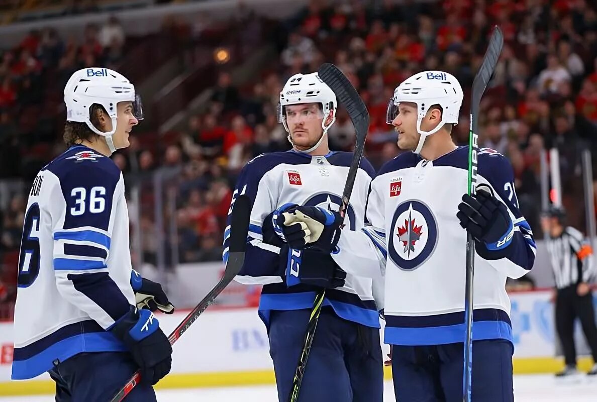 NHL Central Division: Winnipeg Jets players celebrate goal