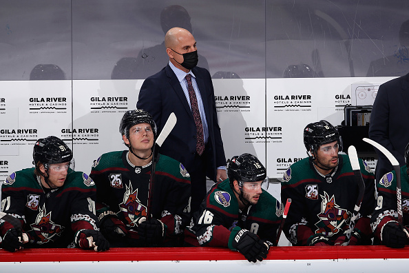 GLENDALE, ARIZONA - JANUARY 16: Head coach Rick Tocchet of the Arizona Coyotes watches from the bench during the first period of the NHL game against the San Jose Sharks at Gila River Arena on January 16, 2021 in Glendale, Arizona. (Photo by Christian Petersen/Getty Images)