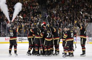 LAS VEGAS, NEVADA - DECEMBER 31: The Vegas Golden Knights celebrate after Nicolas Hague #14 scored a goal in overtime against the Nashville Predators to win their game 5-4 at T-Mobile Arena on December 31, 2022 in Las Vegas, Nevada. (Photo by Ethan Miller/Getty Images)