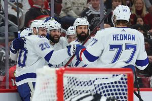 CHICAGO, ILLINOIS - JANUARY 03: Pat Maroon #14 of the Tampa Bay Lightning celebrates with teammates after scoring a goal against the Chicago Blackhawks during the first period at United Center on January 03, 2023 in Chicago, Illinois. (Photo by Michael Reaves/Getty Images)