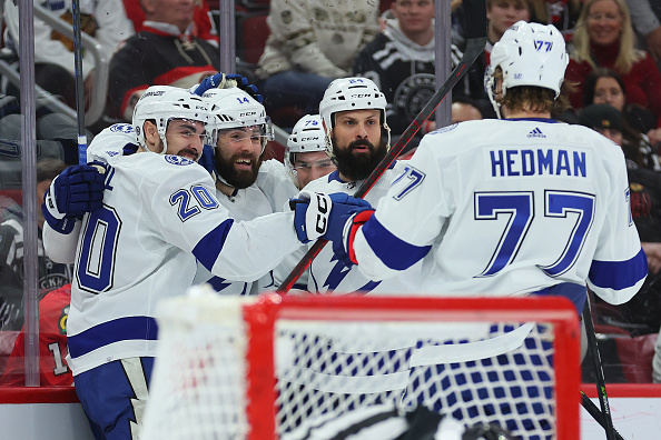 CHICAGO, ILLINOIS - JANUARY 03: Pat Maroon #14 of the Tampa Bay Lightning celebrates with teammates after scoring a goal against the Chicago Blackhawks during the first period at United Center on January 03, 2023 in Chicago, Illinois. (Photo by Michael Reaves/Getty Images)