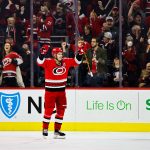 RALEIGH, NC - JANUARY 31: Sebastian Aho #20 of the Carolina Hurricanes celebrates a goal during the third period of the game against the Los Angeles Kings at PNC Arena on January 31, 2023 in Raleigh, North Carolina. The Hurricanes defeated the Kings in overtime 5-4. (Photo by Jaylynn Nash/Getty Images)