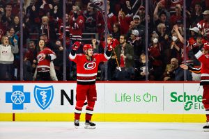 RALEIGH, NC - JANUARY 31: Sebastian Aho #20 of the Carolina Hurricanes celebrates a goal during the third period of the game against the Los Angeles Kings at PNC Arena on January 31, 2023 in Raleigh, North Carolina. The Hurricanes defeated the Kings in overtime 5-4. (Photo by Jaylynn Nash/Getty Images)