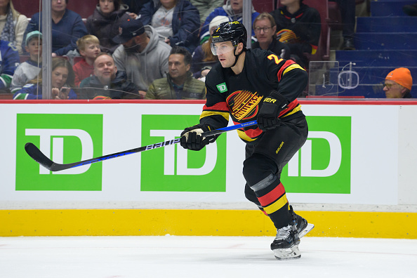 VANCOUVER, CANADA - JANUARY 27: Luke Schenn #2 of the Vancouver Canucks skates up ice during the first period of their NHL game against the Columbus Blue Jackets at Rogers Arena on January 27, 2023 in Vancouver, British Columbia, Canada. (Photo by Derek Cain/Getty Images)