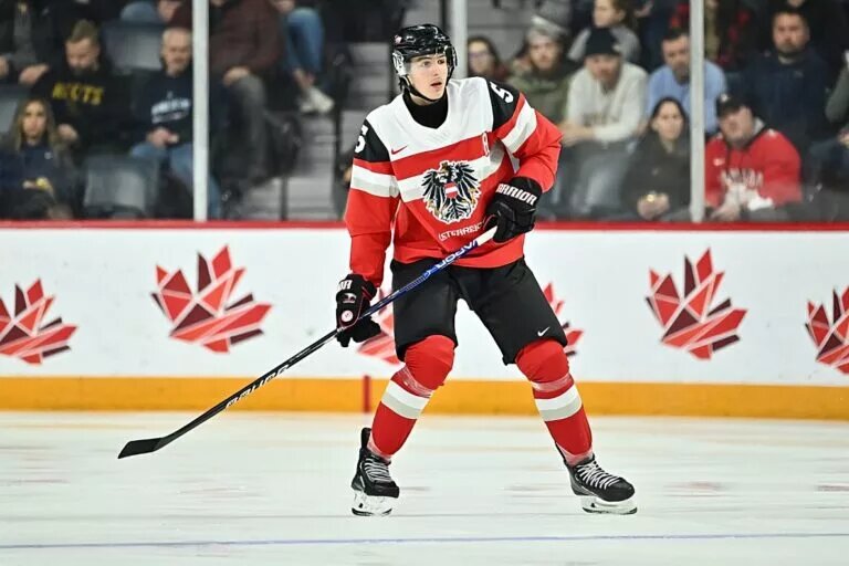 HALIFAX, CANADA - DECEMBER 30: David Reinbacher #5 of Team Austria skates against Team Germany during the first period in the 2023 IIHF World Junior Championship at Scotiabank Centre on December 30, 2022 in Halifax, Nova Scotia, Canada. Team Germany defeated Team Austria 4-2. (Photo by Minas Panagiotakis/Getty Images)