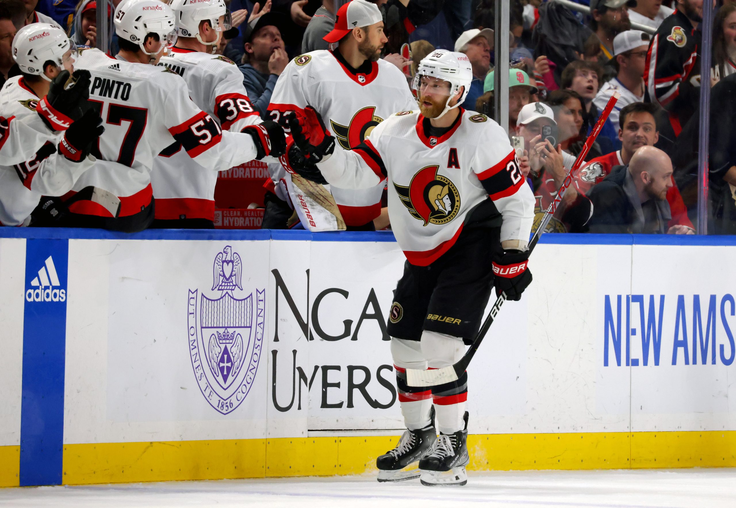 Giroux celebrates with Ottawa Senators roster