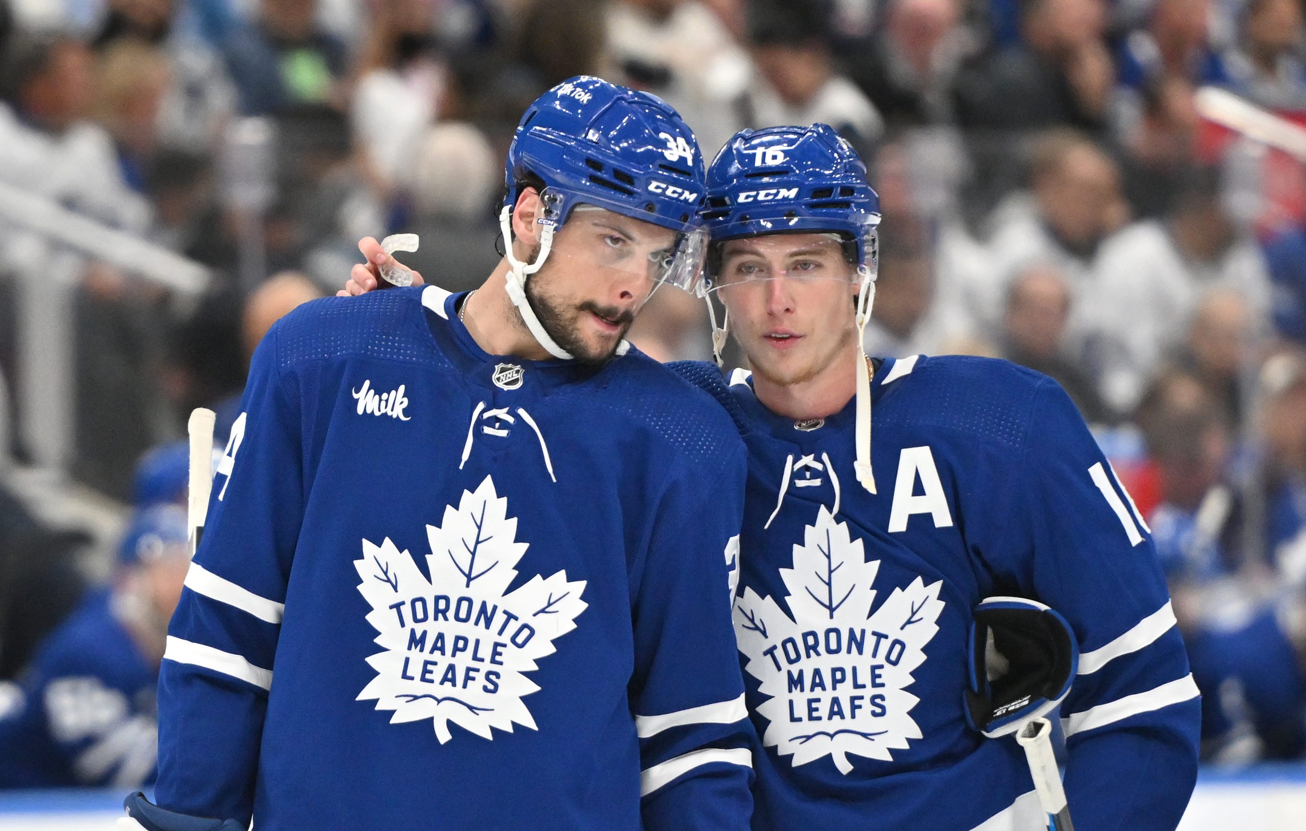 Which players who have played for both Toronto Maple Leafs and New