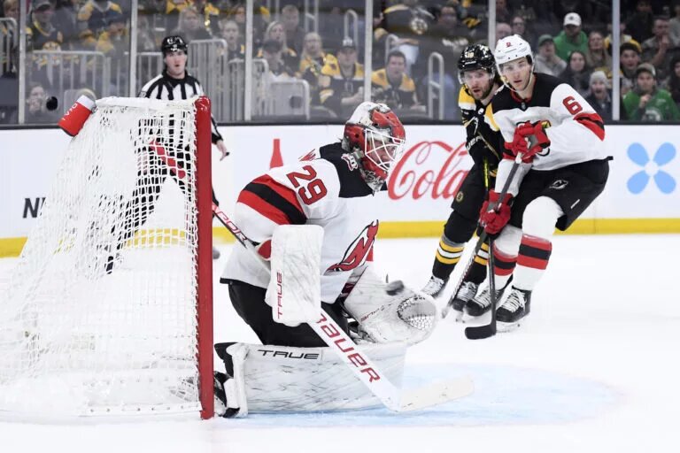 Mackenzie Blackwood makes a save.