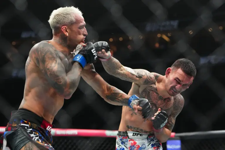 Charles Oliveira and Max Holloway at UFC 326