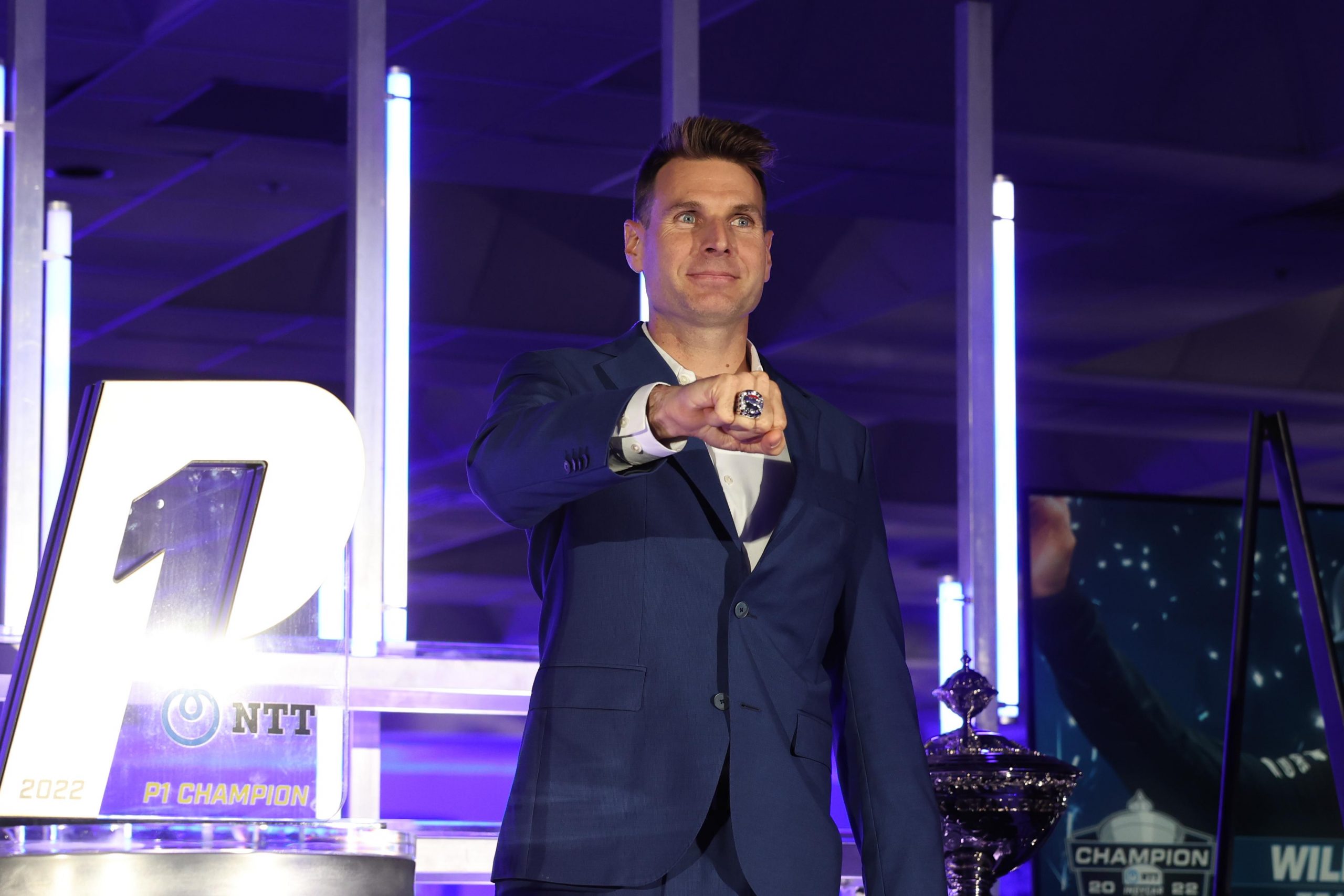 Team Penske's Will Power shows off his champonship ring at the 2022 IndyCar banquet