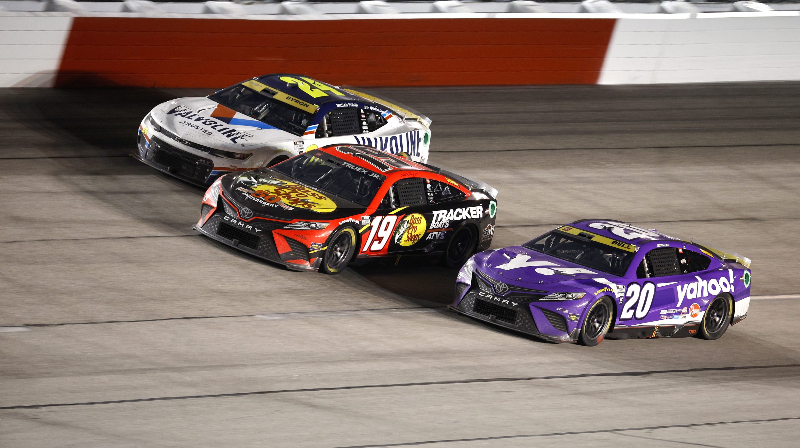 Martin Truex Jr. races alongside William Byron and Christopher Bell during the 2022 Southern 500.