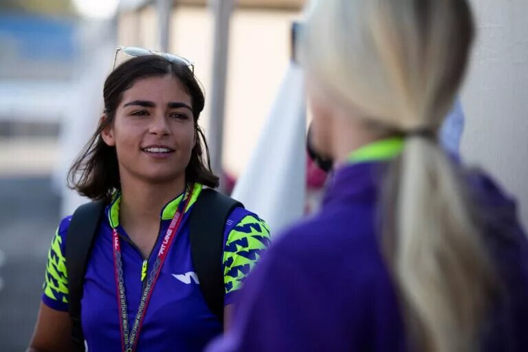 W Series Driver Jamie Chadwick talks in the paddock