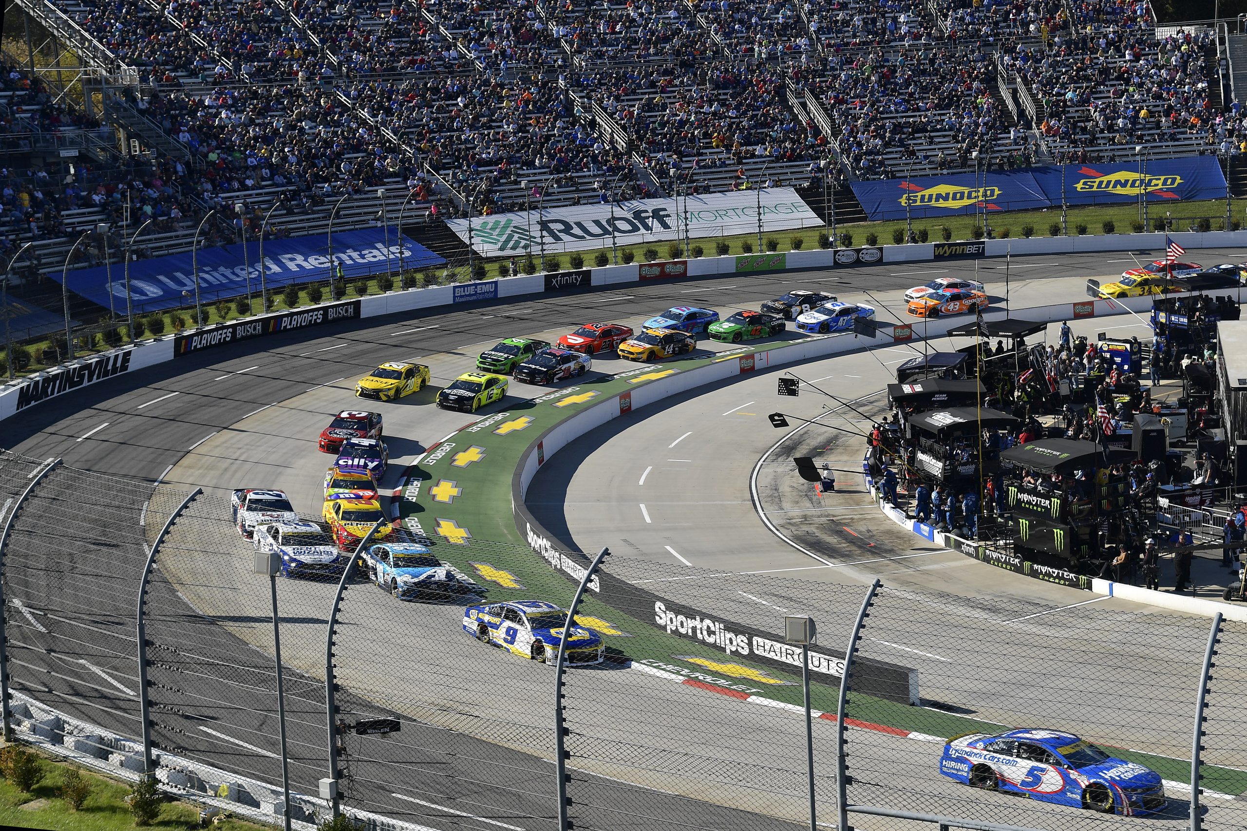 MARTINSVILLE, VIRGINIA - OCTOBER 31: Kyle Larson, driver of the #5 HendrickCars.com Chevrolet, leads the field during the NASCAR Cup Series Xfinity 500 at Martinsville Speedway on October 31, 2021 in Martinsville, Virginia. (Photo by Logan Riely/Getty Images)