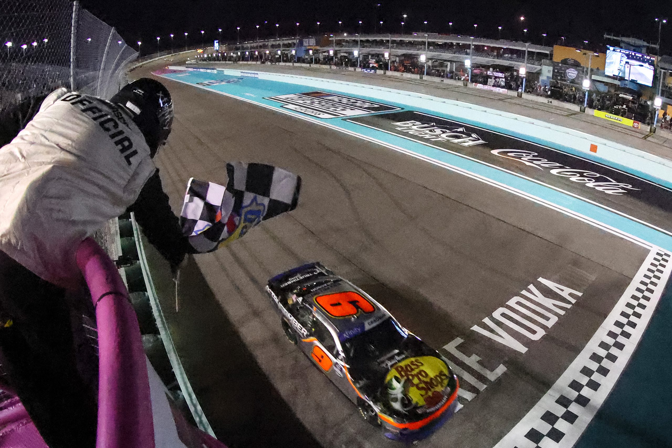 HOMESTEAD, FLORIDA - OCTOBER 22: Noah Gragson, driver of the #9 Bass Pro Shops/TrueTimber/BRCC Chevrolet, takes the checkered flag to win the NASCAR Xfinity Series Contender Boats 300 at Homestead-Miami Speedway on October 22, 2022 in Homestead, Florida. (Photo by Jared East/Getty Images)