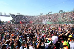 MEXICO CITY, MEXICO - NOVEMBER 07: Fans celebrate at the podium celebrations during the F1 Grand Prix of Mexico at Autodromo Hermanos Rodriguez on November 07, 2021 in Mexico City, Mexico. (Photo by Clive Mason/Getty Images)