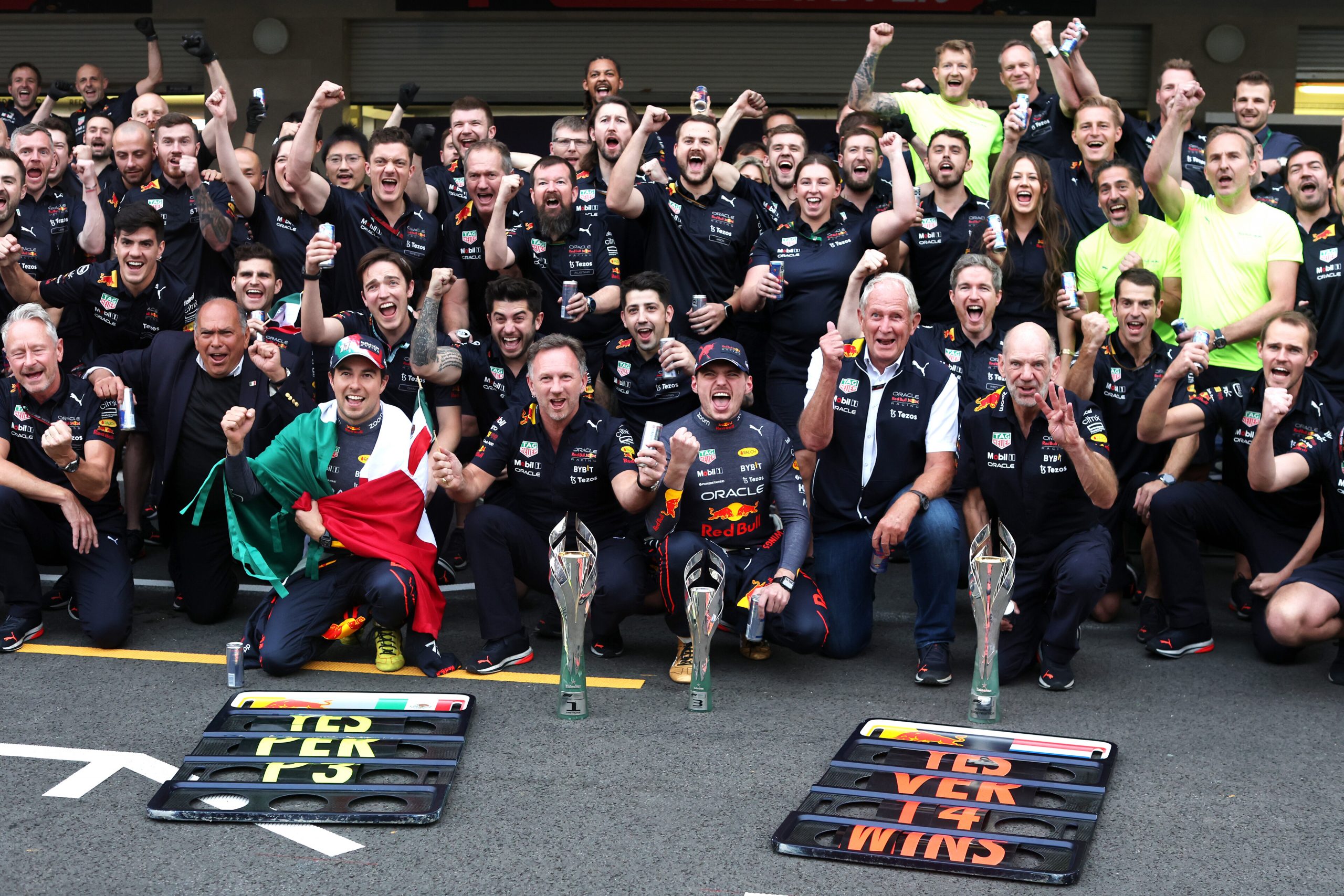 MEXICO CITY, MEXICO - OCTOBER 30: Race winner Max Verstappen of the Netherlands and Oracle Red Bull Racing, Third placed Sergio Perez of Mexico and Oracle Red Bull Racing and the Red Bull Racing team celebrate after the F1 Grand Prix of Mexico at Autodromo Hermanos Rodriguez on October 30, 2022 in Mexico City, Mexico. (Photo by Peter Fox/Getty Images ) // Getty Images / Red Bull Content Pool // SI202210310116 // Usage for editorial use only //
