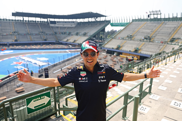 MEXICO CITY, MEXICO - OCTOBER 27: Sergio Perez of Mexico and Oracle Red Bull Racing poses for a photo in the Foro Sol during previews ahead of the F1 Grand Prix of Mexico at Autodromo Hermanos Rodriguez on October 27, 2022 in Mexico City, Mexico. (Photo by Mark Thompson/Getty Images)