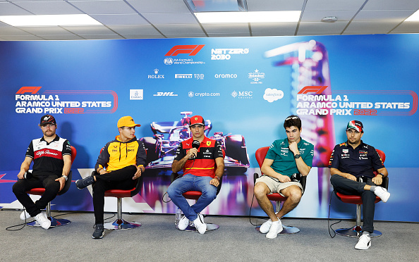 AUSTIN, TEXAS - OCTOBER 20: (L-R) Valtteri Bottas of Finland and Alfa Romeo F1, Lando Norris of Great Britain and McLaren, Carlos Sainz of Spain and Ferrari, Lance Stroll of Canada and Aston Martin F1 Team and Sergio Perez of Mexico and Oracle Red Bull Racing attend the Drivers Press Conference during previews ahead of the F1 Grand Prix of USA at Circuit of The Americas on October 20, 2022 in Austin, Texas. (Photo by Jared C. Tilton/Getty Images)