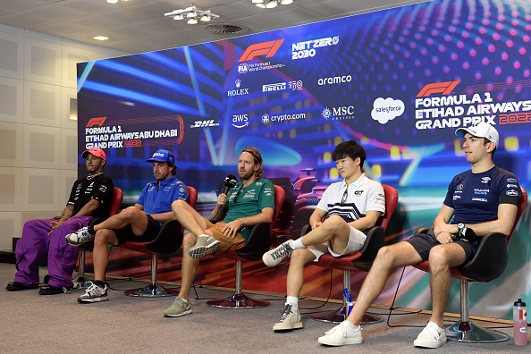 ABU DHABI, UNITED ARAB EMIRATES - NOVEMBER 17: Lewis Hamilton of Great Britain and Mercedes, Fernando Alonso of Spain and Alpine F1, Sebastian Vettel of Germany and Aston Martin F1 Team, Yuki Tsunoda of Japan and Scuderia AlphaTauri and Nicholas Latifi of Canada and Williams talk in a press conference during previews ahead of the F1 Grand Prix of Abu Dhabi at Yas Marina Circuit on November 17, 2022 in Abu Dhabi, United Arab Emirates. (Photo by Rudy Carezzevoli/Getty Images)