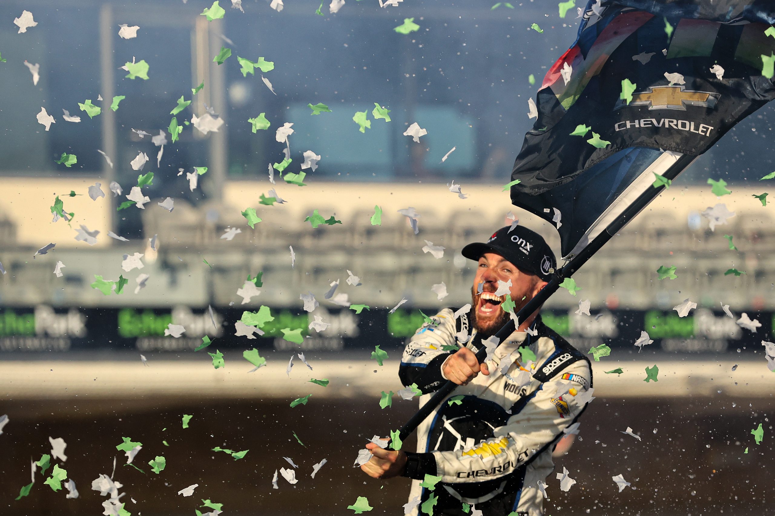 AUSTIN, TEXAS - MARCH 27: Ross Chastain, driver of the #1 ONX Homes/iFly Chevrolet, celebrates after winning the NASCAR Cup Series Echopark Automotive Grand Prix at Circuit of The Americas on March 27, 2022 in Austin, Texas. (Photo by Dylan Buell/Getty Images)