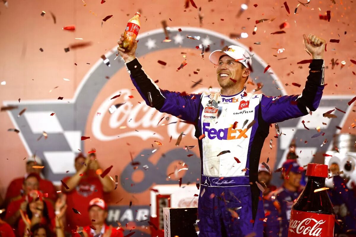 Denny Hamlin celebrates his win at the 2022 Coke 600
