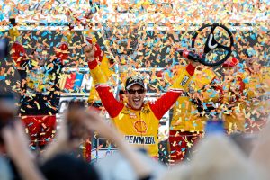 Joey Logano celebrates his NASCAR Cup Series Championship at Phoenix Raceway