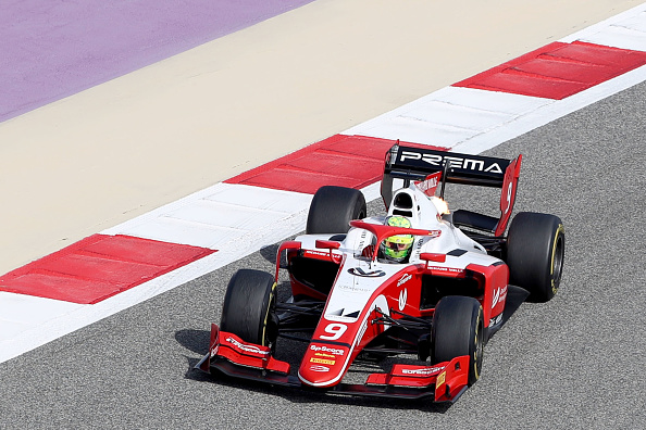 Prema's German driver Mick Schumacher steers his car during a Formula 2 race ahead of the Formula One Bahrain Grand Prix at the Sakhir circuit in the desert south of the Bahraini capital Manama, on March 31, 2019. - Mick Schumacher, son of seven-time world champion Michael, made his Formula Two debut this weekend in Bahrain after being crowned Formula Three champion last year with Prema, an Italian team allied with the Ferrari Drivers Academy with whom he joined in January. (Photo by KARIM SAHIB / AFP) (Photo credit should read KARIM SAHIB/AFP via Getty Images)