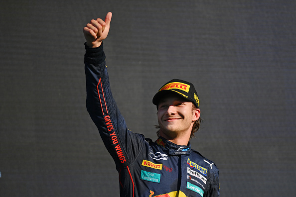 ZANDVOORT, NETHERLANDS - SEPTEMBER 03: Third placed Dennis Hauger of Norway and Prema Racing (1) celebrates on the podium during the Round 12:Zandvoort Sprint race of the Formula 2 Championship at Circuit Zandvoort on September 03, 2022 in Zandvoort, Netherlands. (Photo by Dan Mullan/Getty Images)