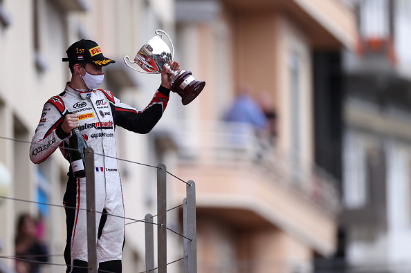 MONTE-CARLO, MONACO - MAY 22: Race winner Theo Pourchaire of France and ART Grand Prix celebrates on the podium during the Feature Race of Round 2:Monte Carlo of the Formula 2 Championship at Circuit de Monaco on May 22, 2021 in Monte-Carlo, Monaco. (Photo by Lars Baron/Getty Images)